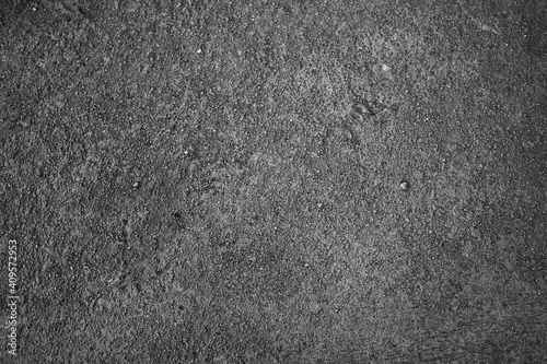 Dark cement black and white background. dirty old wall texture abstract.