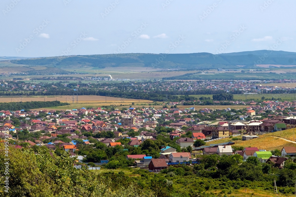 View from the mountain to a small town