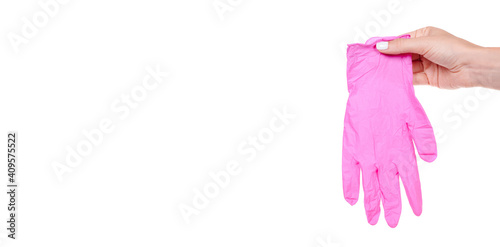 Hand with pink medical protection glove, isolated on white background.