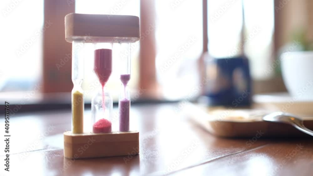  hourglass on the table, time countdown, clock with sand
