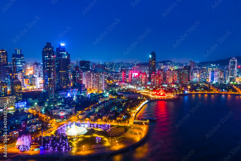 Night view of modern city buildings in Qingdao, China