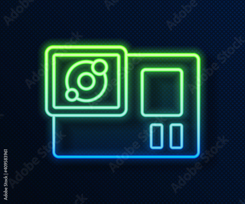 Glowing neon line Action extreme camera icon isolated on blue background. Video camera equipment for filming extreme sports. Vector.