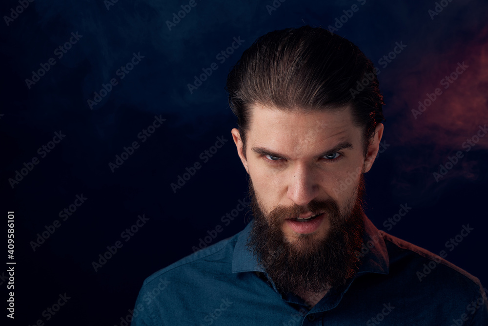 Cute bearded man in shirt elegant style close-up dark background Cute bearded man in shirt elegant style close-up dark background