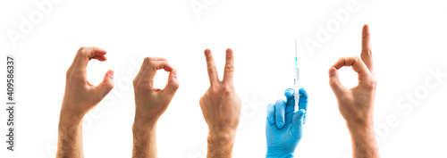 isolated on white background: hands of people folded letters covid. covid vaccination concept. one hand with syringe and needle