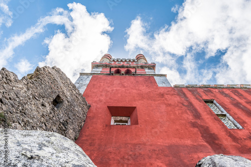 The red wall on the rock in the Pena National Palace in Sintra town, Portugal