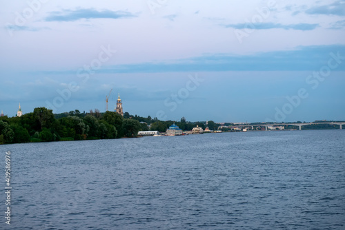 View of the historical part of the city of Kostroma from the Volga River on a summer evening © Konstantin
