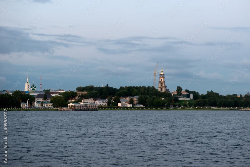View of the historical part of the city of Kostroma from the Volga River on a summer evening