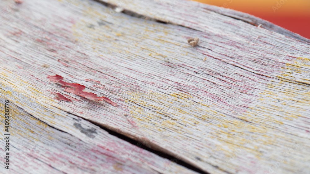 Fototapeta premium The surface of the wood with the false color came off.