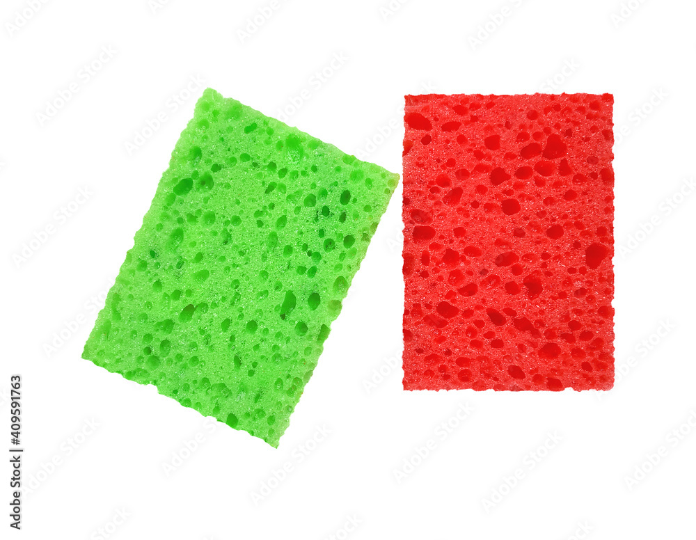 Red and green rectangular porous washing sponges isolated on a white background Red and green rectangular porous washing sponges isolated on a white background