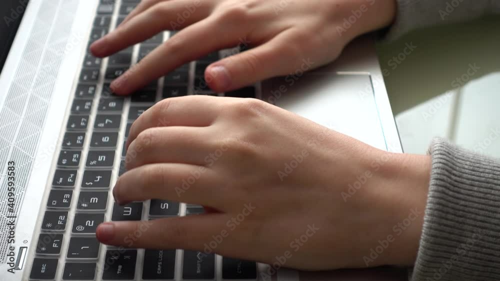 The girl working at home office hands on keyboard. The girl working at home office hands on keyboard.