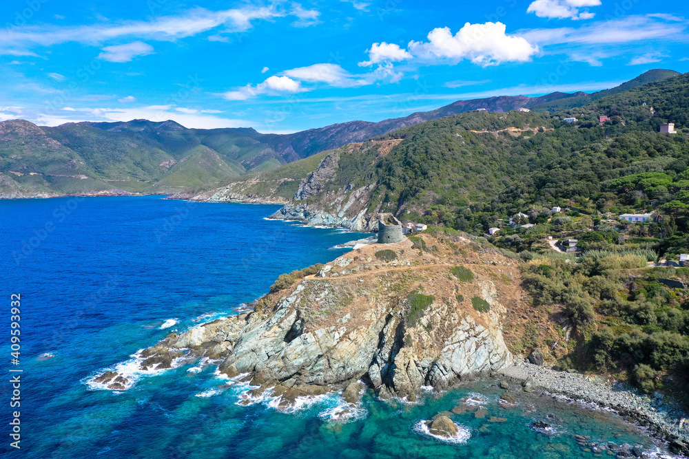 Drone view from the coastal vegetation on the rocky coastline of Cap Corse, Corsica, France