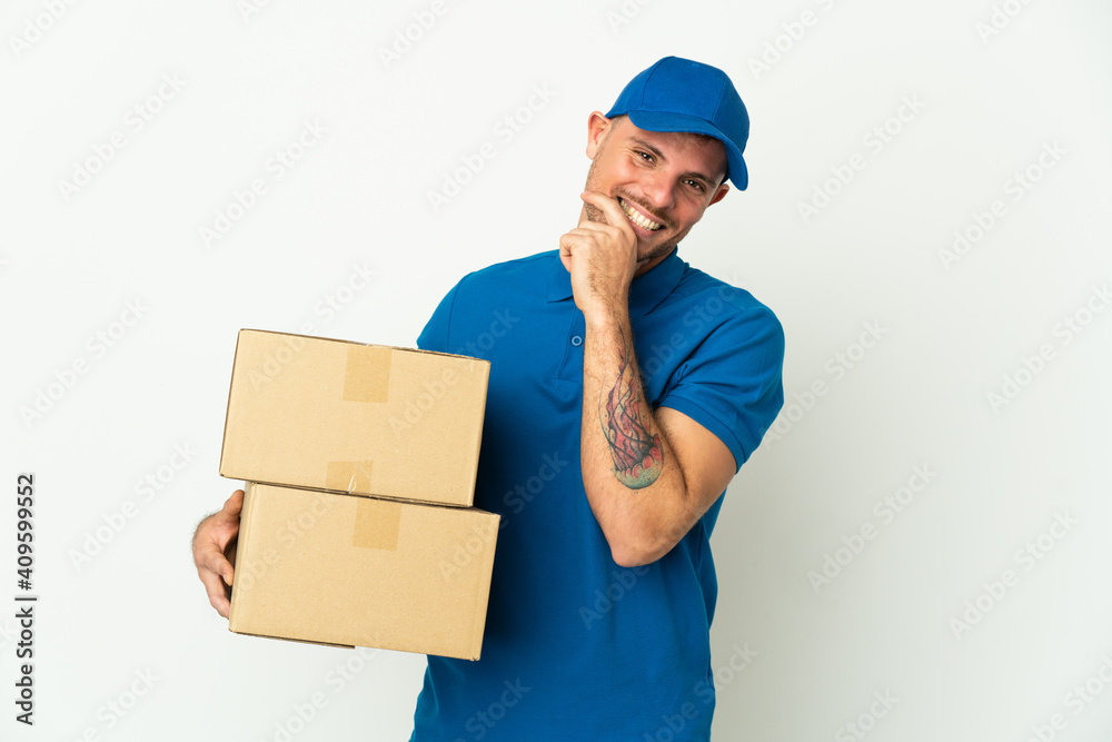 Delivery caucasian man isolated on white background happy and smiling Delivery caucasian man isolated on white background happy and smiling