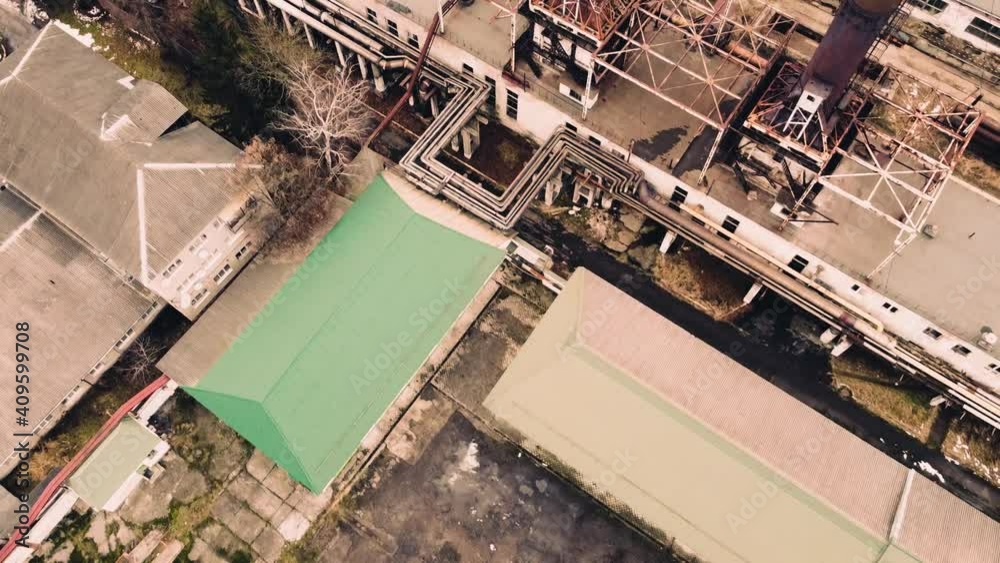 Aerial view of a drone flying over an industrial plant. Plant pipes. Aerial view of a drone flying over an industrial plant. Plant pipes.