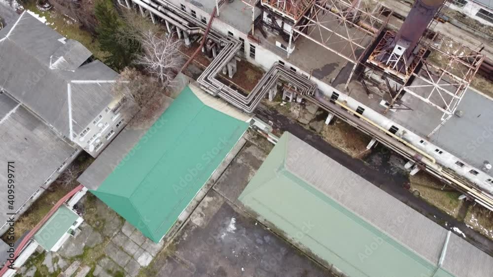 Aerial view of a drone flying over an industrial plant. Plant pipes. Aerial view of a drone flying over an industrial plant. Plant pipes.