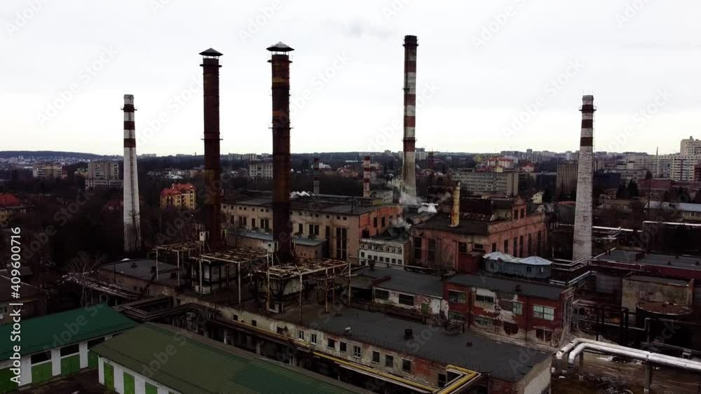 Aerial view of a drone flying over an industrial plant. Plant pipes. Aerial view of a drone flying over an industrial plant. Plant pipes.