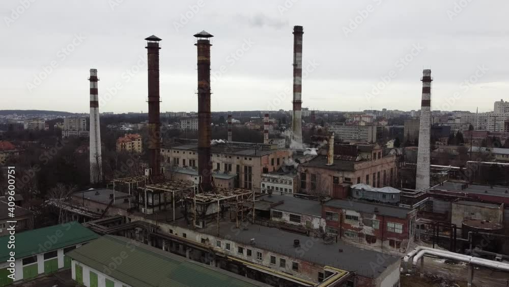 Aerial view of a drone flying over an industrial plant. Plant pipes. Aerial view of a drone flying over an industrial plant. Plant pipes.