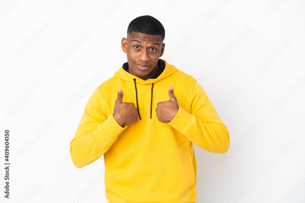Young latin man isolated on white background with surprise facial expression Young latin man isolated on white background with surprise facial expression