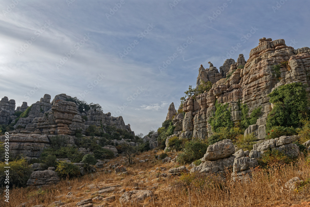 Some of the many intricate and varied Limestone rock formations seen in the El Torcal Nature Reserve in Andalucia from a Footpath.