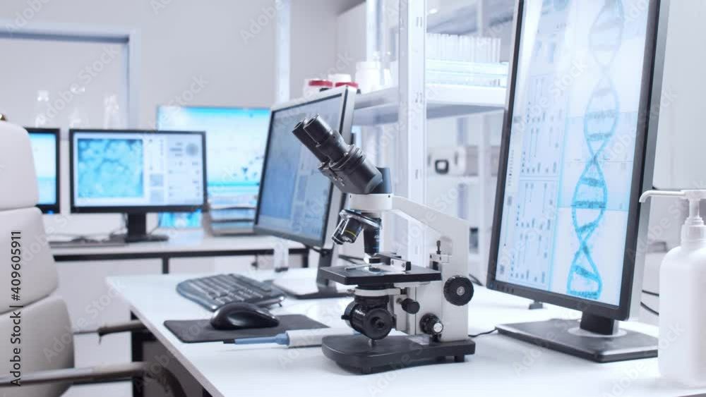 Interior of modern scientific research laboratory. Genetic engineer workplace. Futuristic technology and science concept. Interior of modern scientific research laboratory. Genetic engineer workplace. Futuristic technology and science concept.