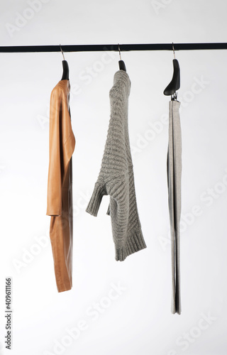 Elegant and trendy women's clothes hanging
