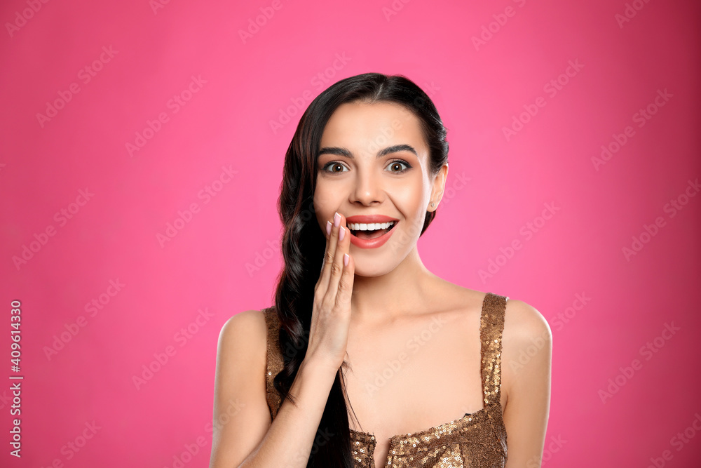 Portrait of surprised woman on pink background Portrait of surprised woman on pink background