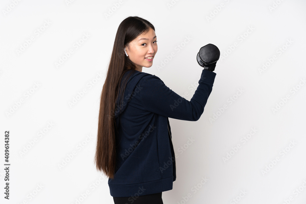 Young sport asian woman isolated on white background making weightlifting Young sport asian woman isolated on white background making weightlifting