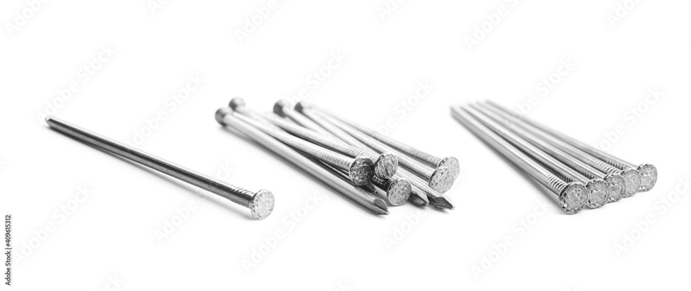 Set with sharp metal nails on white background, banner design Set with sharp metal nails on white background, banner design
