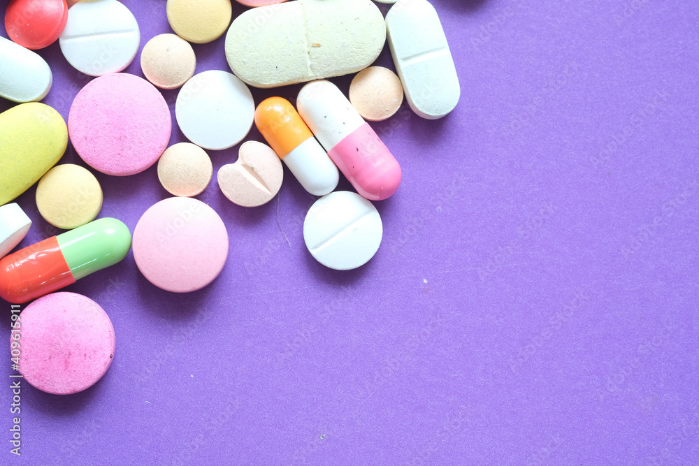Close up of many colorful pills and capsules Close up of many colorful pills and capsules