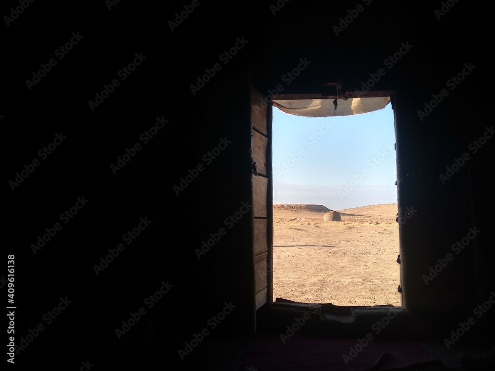 Desert view from an open door