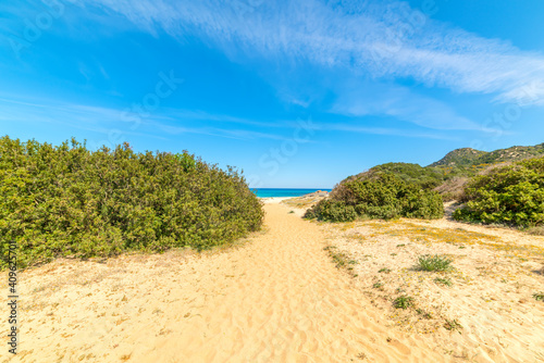 Path to the beach in Cala Pira shoreline