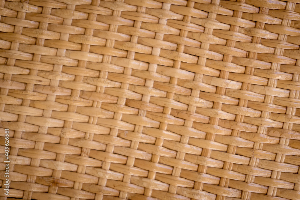 Background and texture of old natural woven straw.