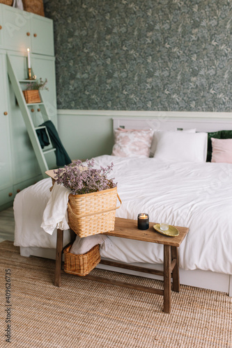 Interior in a bedroom for a house in a gentle green color Retro style Scandivian