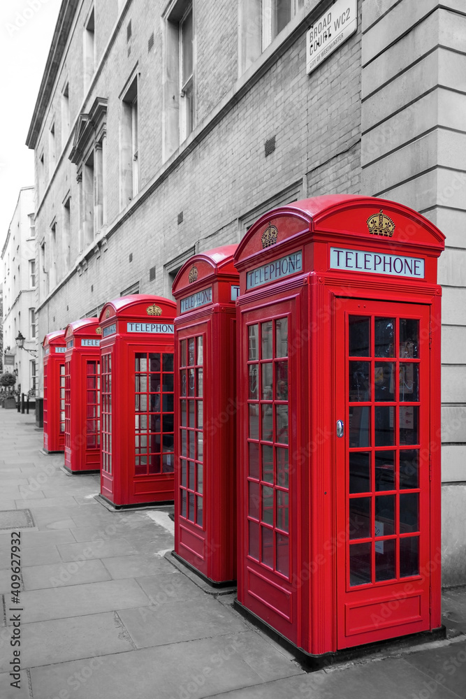 The famous red telephone boxes in London, England. The famous red telephone boxes in London, England.