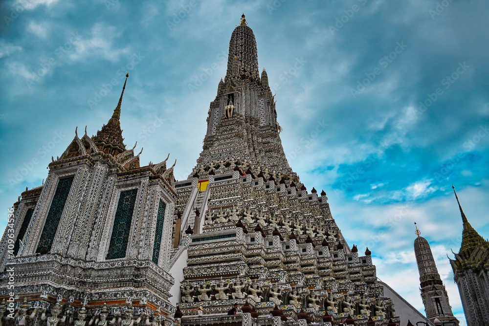 Temple of Dawn, Wat Arun is a buddhist temple and derives its name from the Hindu god Aruna often personified as the radiations of the rising sun