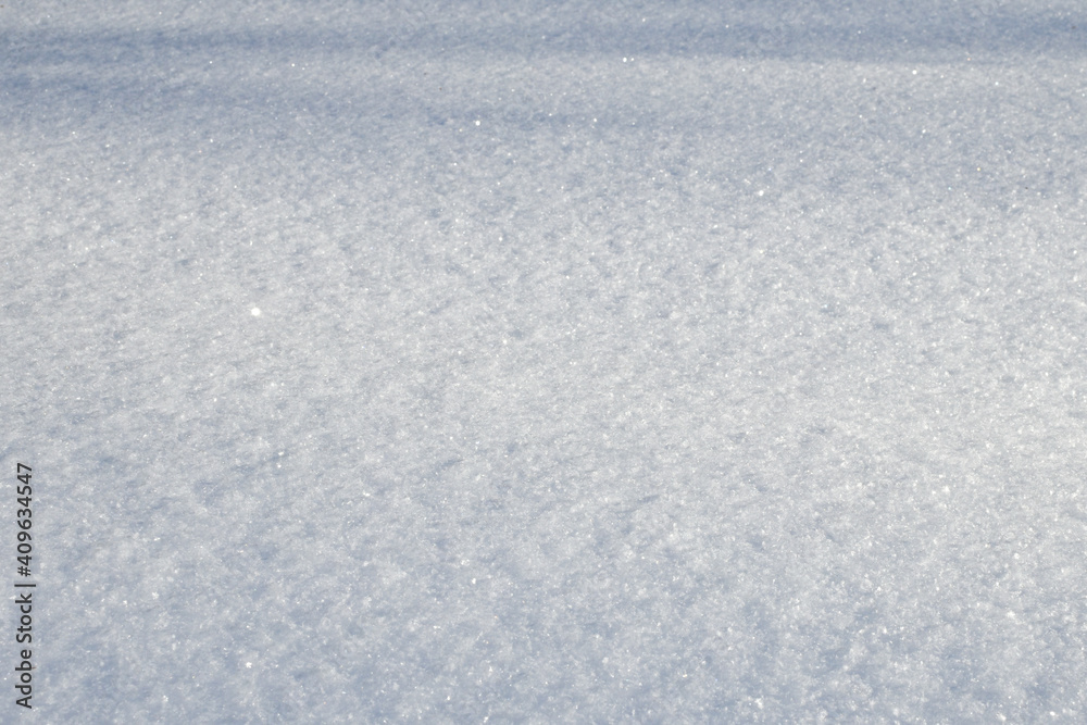 White snow texture on clear day. Winter background. Snow drifts. white snowflakes background, rough pattern of snow texture White snow texture on clear day. Winter background. Snow drifts. white snowflakes background, rough pattern of snow texture
