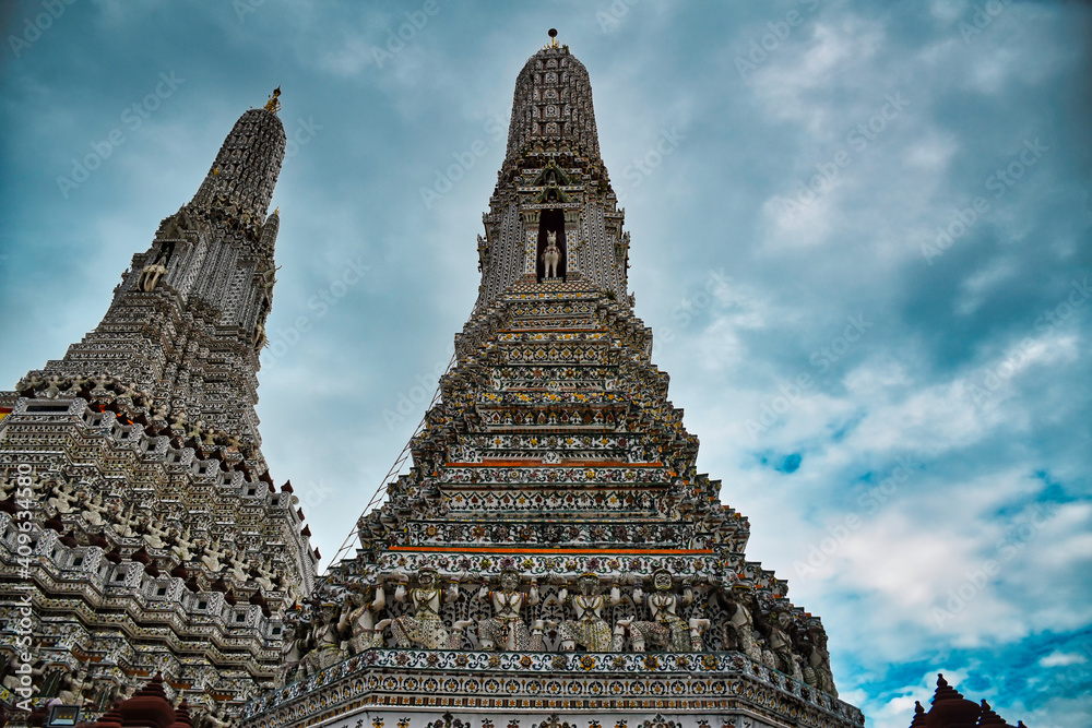 Temple of Dawn, Wat Arun is a buddhist temple and derives its name from the Hindu god Aruna often personified as the radiations of the rising sun
