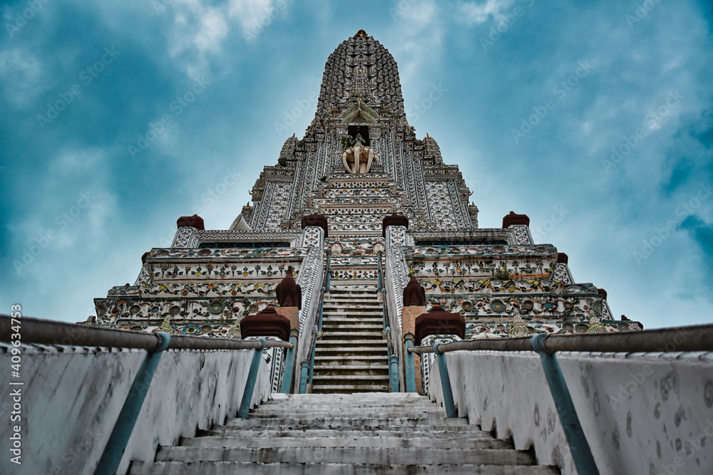 Temple of Dawn, Wat Arun is a buddhist temple and derives its name from the Hindu god Aruna often personified as the radiations of the rising sun