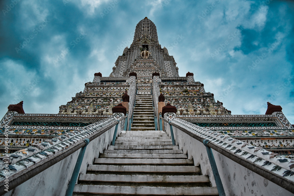 Temple of Dawn, Wat Arun is a buddhist temple and derives its name from the Hindu god Aruna often personified as the radiations of the rising sun