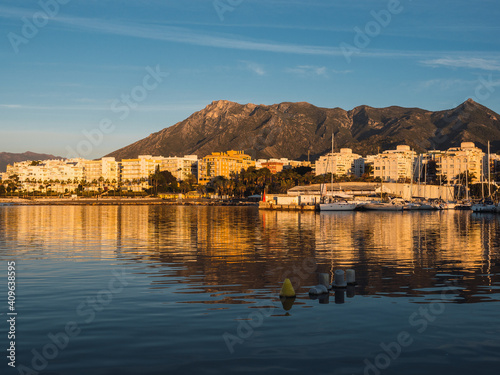 View of Sierra Blanca mountain from Marbella port. Sierra Blanca is a mountainous massif of the Penibética mountain range photo