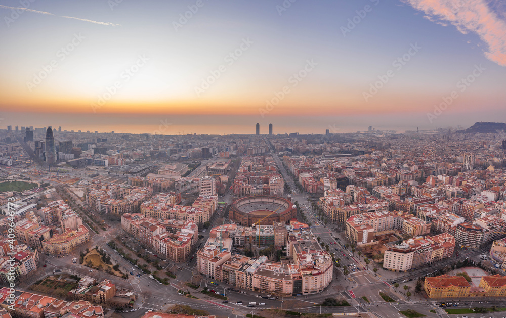 Aerial drone shot of Barcelona city before sunrise time