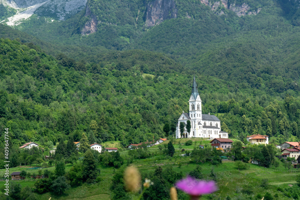 Church of the Sacred Heart and village of Dreznica near Kobarid Slovenia