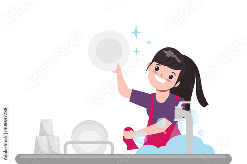 Housewife is washing the dish in the kitchen.