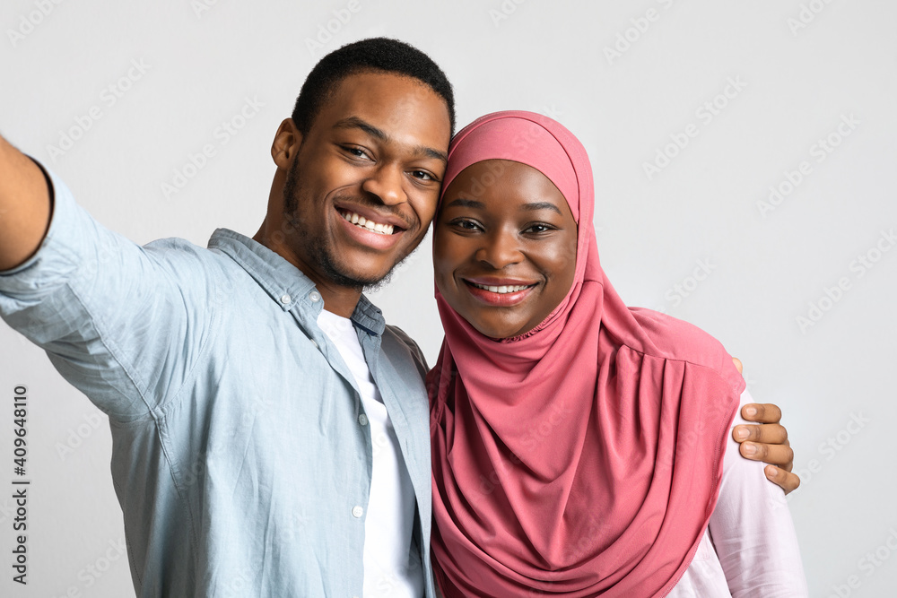 Selfie of smiling african american embracing couple Selfie of smiling african american embracing couple