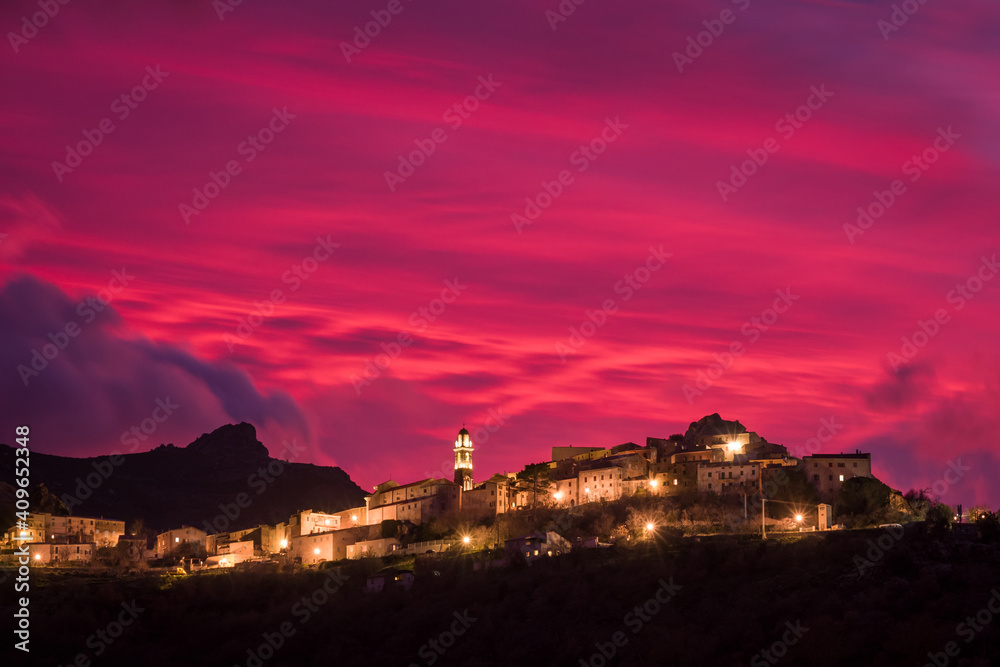 Dramatic evening sky over Speloncato in Corsica