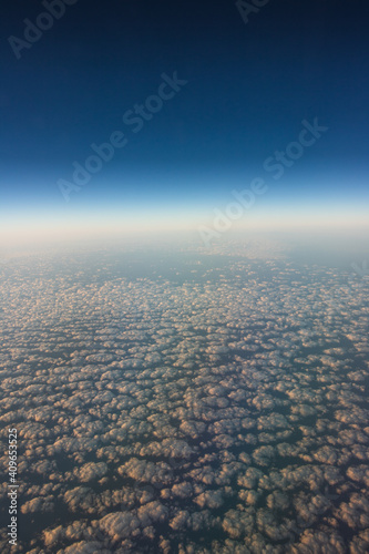 Travel view window plane  with mountains and clouds at background. Space for text.  Concept Image