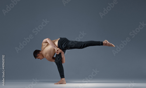 Yoga keeps balanc in a difficult pose on one leg
