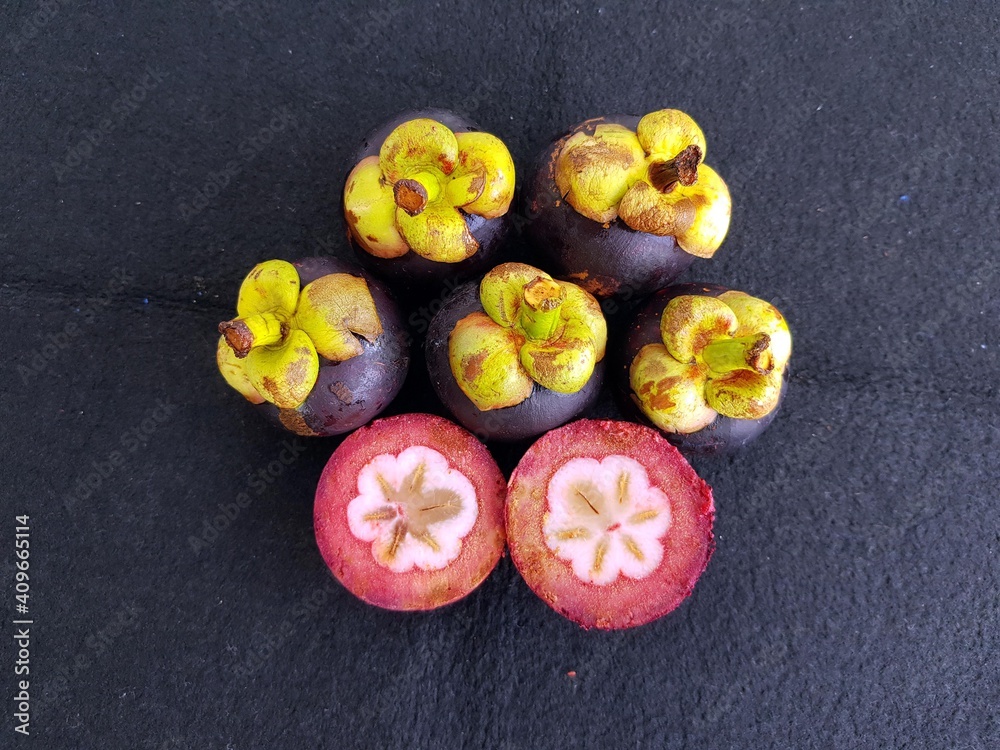 Mangosteen (Garcinia mangostana), also known as the purple mangosteen