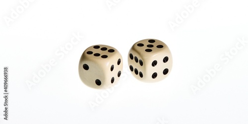 A pair of white dice thrown with the number eleven isolated on a white background