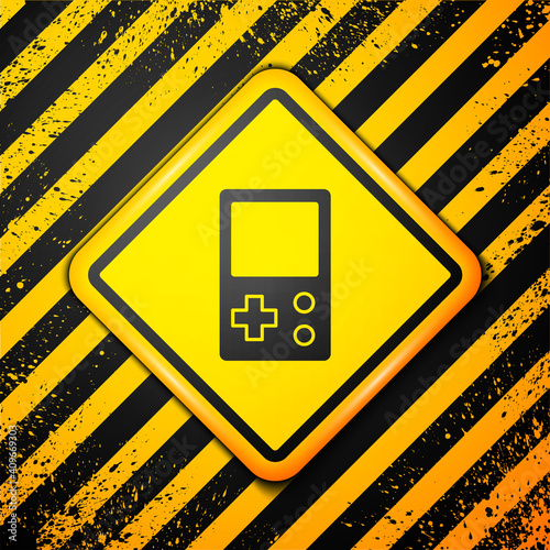 Black Portable tetris electronic game icon isolated on yellow background. Vintage style pocket brick game. Interactive playing device. Warning sign. Vector.