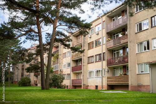 Four storey, residential block of flats house (Khrushchyovka).